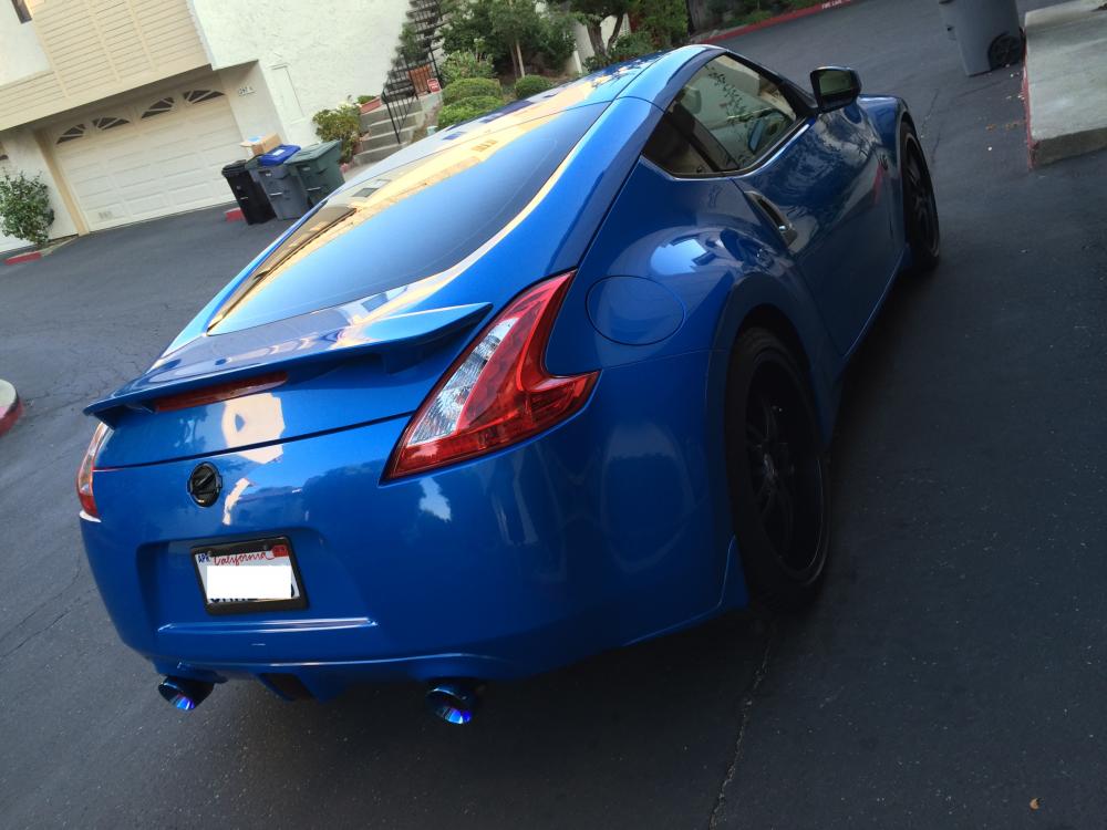 Debaged with Evo-R CF emblem, CF license plate, rear window tint, sport spoiler and the AAM Competition S-LINE short tail exhaust w/polished tips.