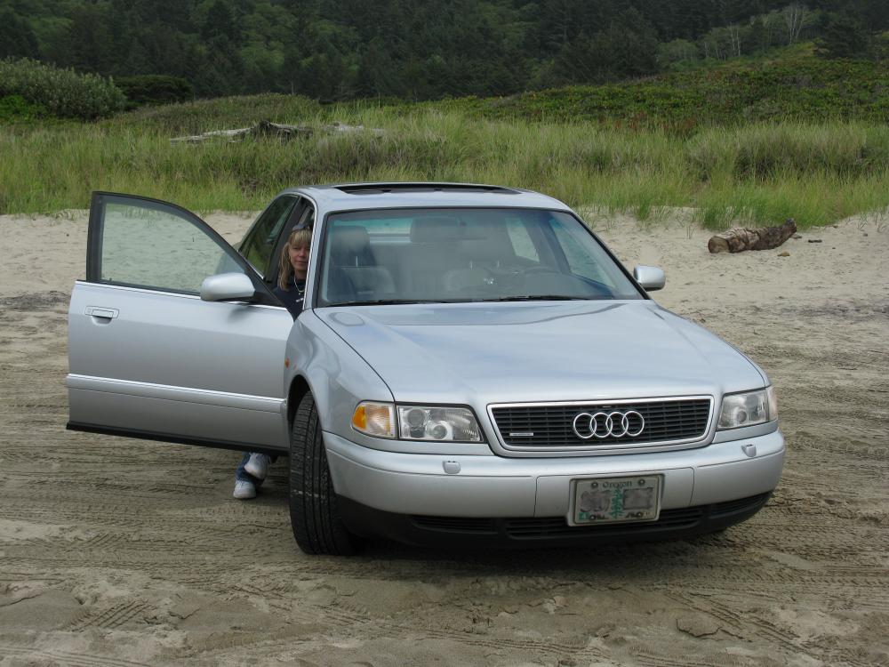 Wife and Audi at the beach