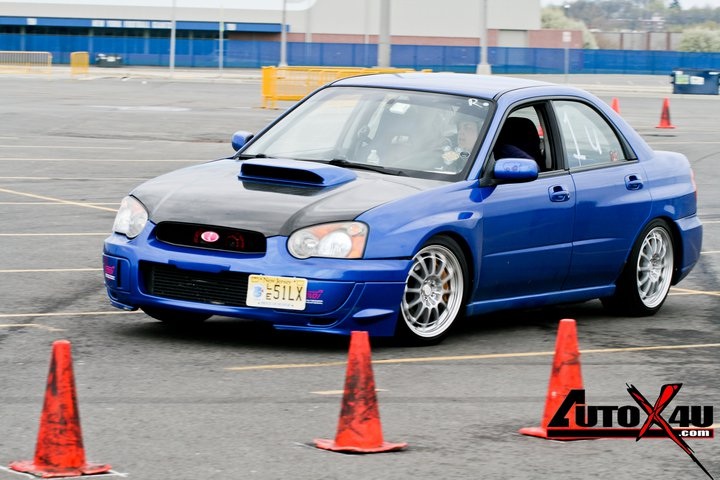 2004 Subaru sti 
Tein flex coilovers, front mount intercooler, vf48 turbo, tuned on a Cobb accessport by EFI logics. Rest in peace Chris Kiewert. Made 308whp 318wtq on their mustang dyno.