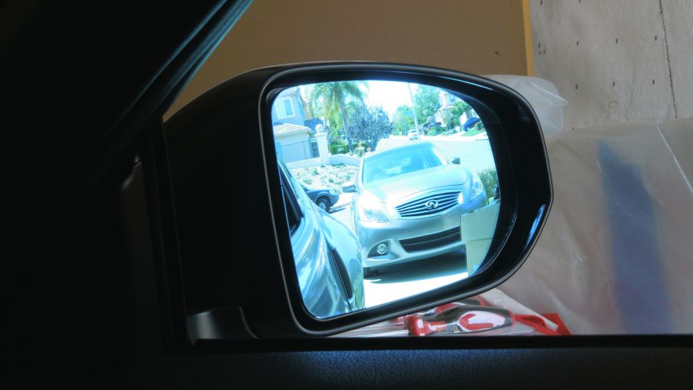 Blind spot killer.   Zoom Engineering Blue Mirrors from KamiSpeed.com   View of passenger side.  Notice the box sitting right next to the car's C pillar.  It cannot be seen with the OEM mirror.  Should have taken a shot before the install.