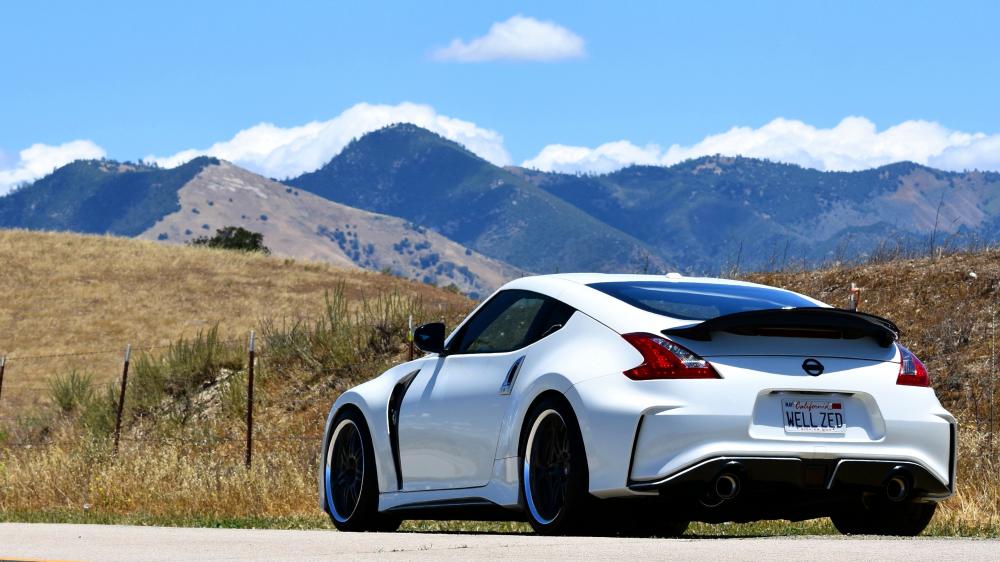 Finally completed the mod. Moved on from the Sunline rep from AeroJacket onto the 2015+ Nismo kit. No red accents on the kit and went with a black and white finish instead. Picked up black emblems as well.