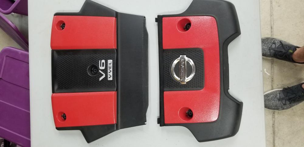 OEM red Nismo engine cover