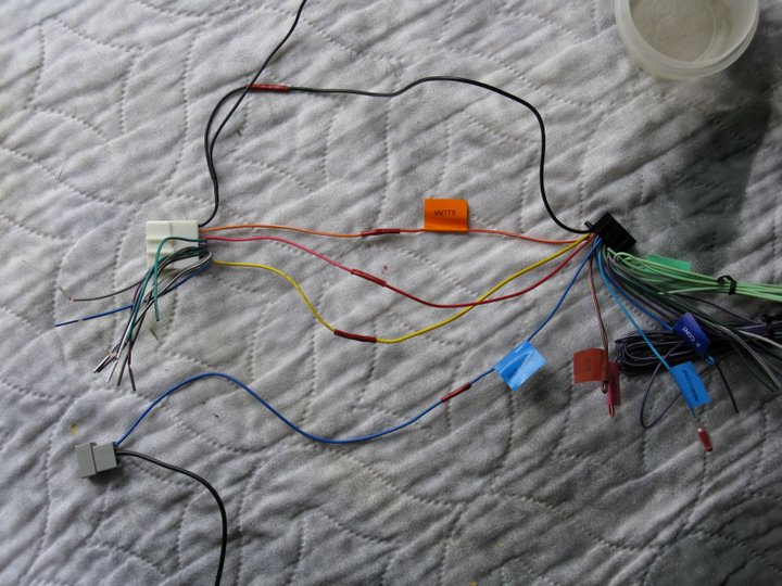 024
Kenwood to Factory wire harness.  The colors matched!  At least the important ones did.  The speaker wires are different colors but its not hard to figure out which one goes where.