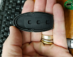 Add the new rubber button gasket to the upper cover of the key fob