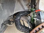 Route the cooling tube as shown behind the suspension arm.  I have not found a need to secure it to the arm as others have done.  This tube is quite...
