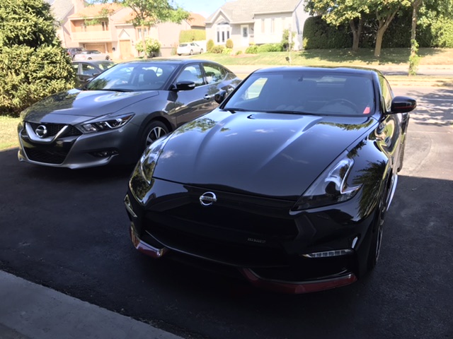 My weekend toy alongside my daily driver, a 2017 Maxima.  Love both!