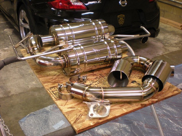 Muffler section with tips, clamps, and hardware