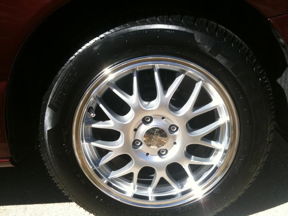 Cheapo Saturn wheels.  But I like em.