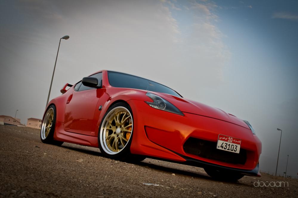 Work Gnosis, sunline CF roof cap and resprayed in Ferrari Red