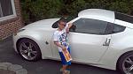 My nephew posin' in front of his future car.  Well at least that's what he told me.