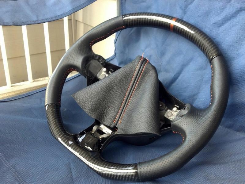 new cf steering wheel with matching shift boots. thanks to tony at cf element. he really does top notch work!