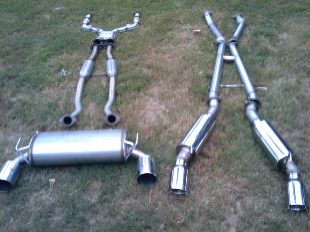 Stock NISMO catback exhaust (left) and GTM 3" Catback exhaust (right)