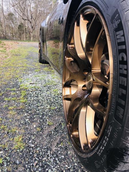 AG brushed antiqued bronze wrapped in Michelin Pilot Sport 4S.