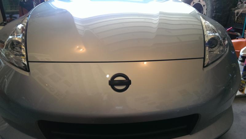 Dipped front emblem