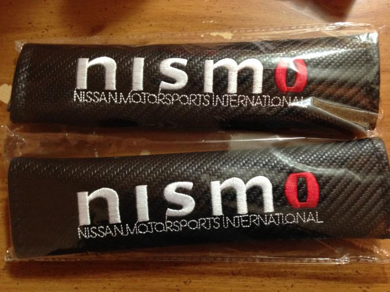Just a few cosmetic additions, Nismo seat belt decorations.