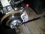 Torque spacer as you would your wheel to 80ft-lbs.