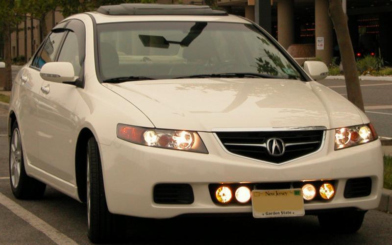 Some say the mixed white and yellow lenses look like an Englishman's bad teeth, so I'd advise adding only ONE set of lights to the snout of your 370Z.  (I'm going with the clear spot/driving lights, myself.)