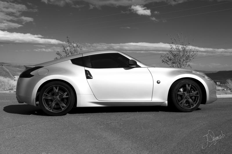 370z with plastidip gloss black rims and door handles