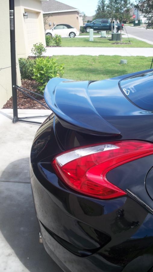 carbon signal add on spoiler molded to stock spoiler, with UAM amuse rear bumper.