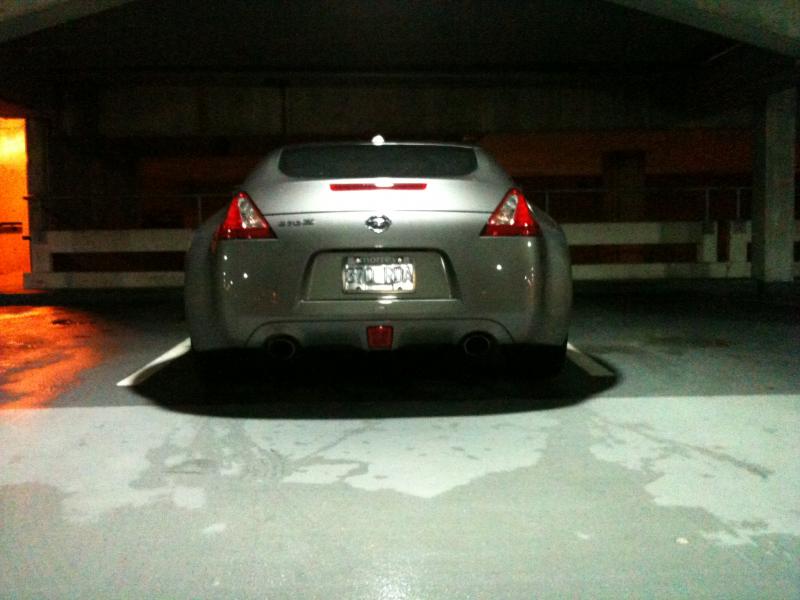 dent on the bumper from backing into a garbage can.