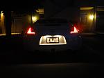 uglly oem rear license plate light =(