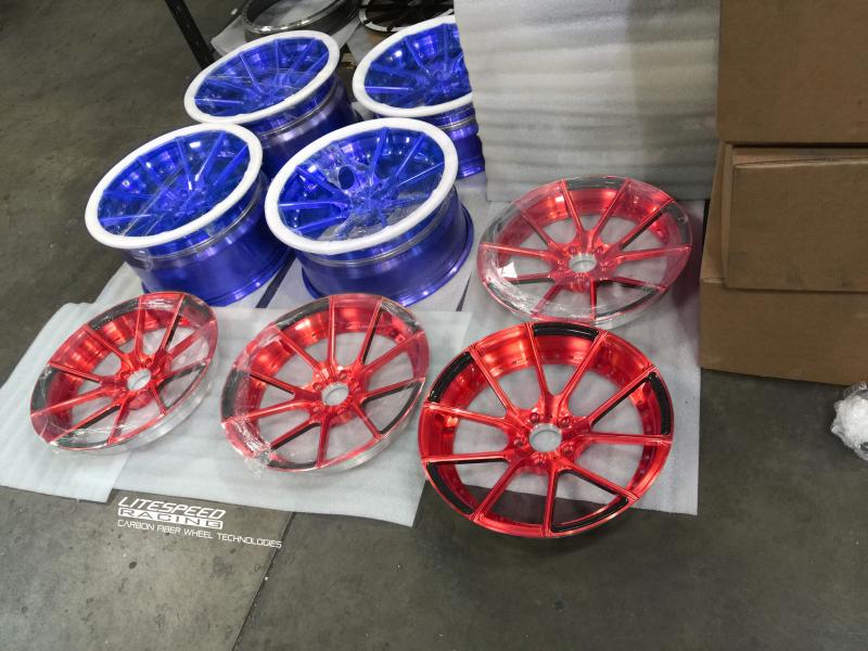 red white and  blue. Forged 2 piece wheels. Made in the USA
