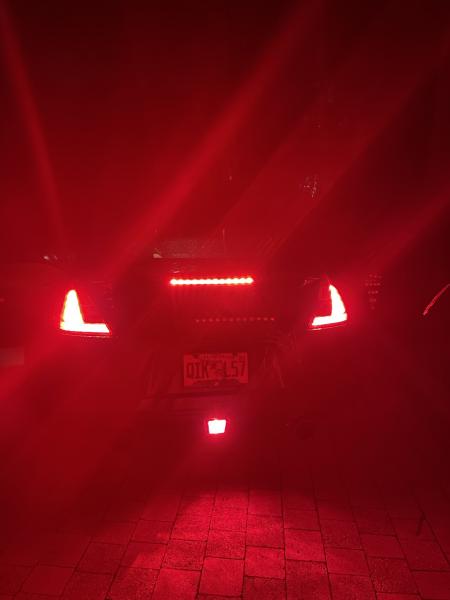 Spliced the 4th tail light into the driver side tail light.