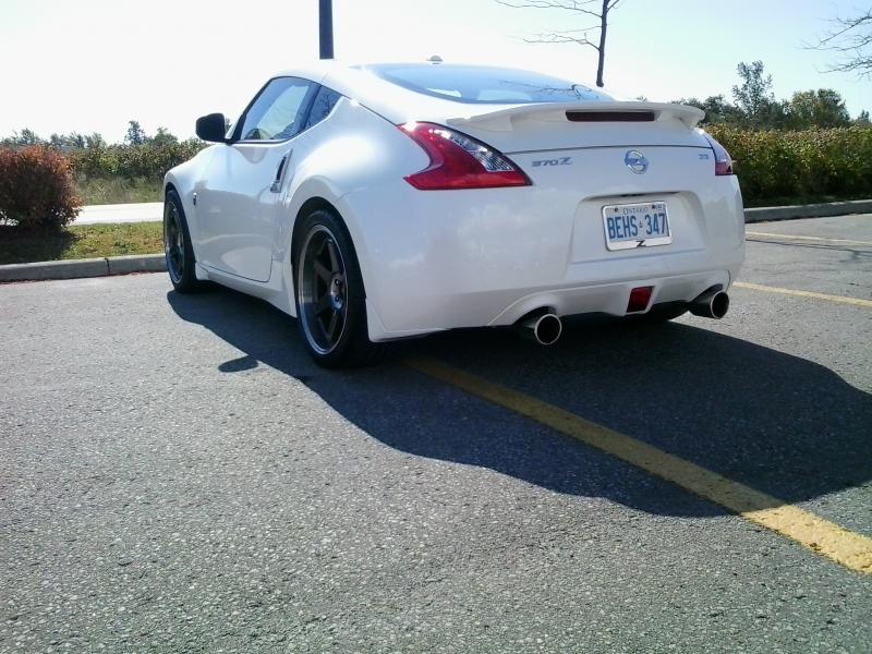 Stillen Catback Exhaust; Stillen Gen3 Intakes and pulley, Nismo short throw shifter, Z-Badging (F&B); 19" Volk TE37SL Racing Rims, Yokohama Neova AD08 tires 295(R) 245(F). Zeetoyz Caps, Z1 hood lift, Z1 Mats; Tint.