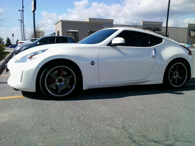 Stillen Catback Exhaust; Stillen Gen3 Intakes and pulley, Nismo short throw shifter, Z-Badging (F&B); 19" Volk TE37SL Racing Rims, Yokohama Neova AD08 tires 295(R) 245(F). Zeetoyz Caps, Z1 hood lift, Z1 Mats; Tint.