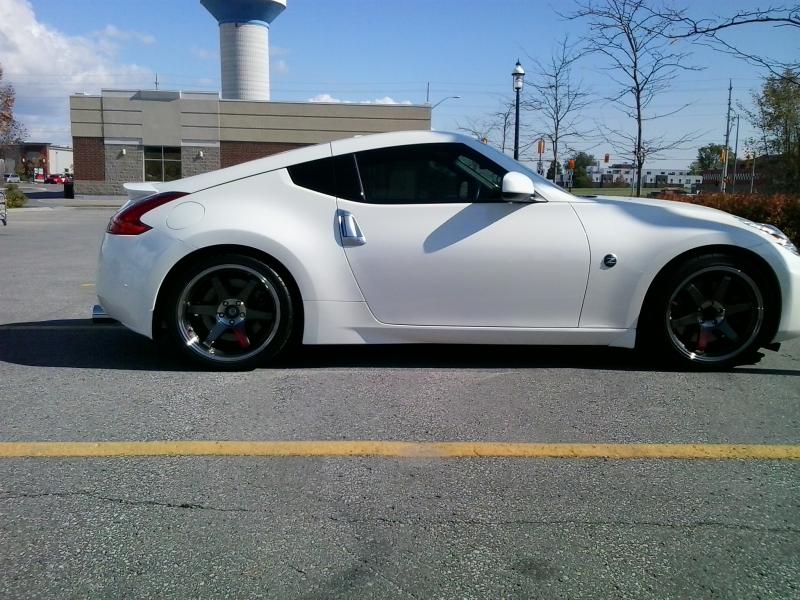 Stillen Catback Exhaust; Stillen Gen3 Intakes and pulley, Nismo short throw shifter, Z-Badging (F&B); 19" Volk TE37SL Racing Rims, Yokohama Neova AD08 tires 295(R) 245(F). Zeetoyz Caps, Z1 hood lift, Z1 Mats; Tint.