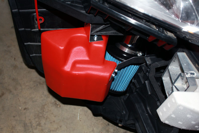 Replacement wiper fluid reservoir.  The only cutting involved in the install is cutting the filler neck off of the factory reservoir and mating it to the replacement.