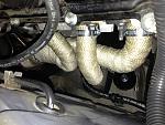 exhaust wrap,  hope they survive daily driving if not going to change to ceramic coated.