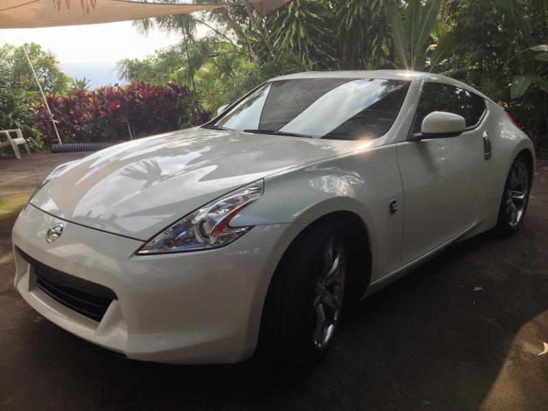 My 3rd Z. Pearlwhite. '09 370Z
picking up a 2011 370z tomorrow.