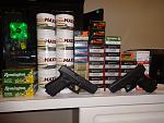 My Glock 19 and 23 and my small ammo build up in the last 2 months. Building it up slowly but surely.