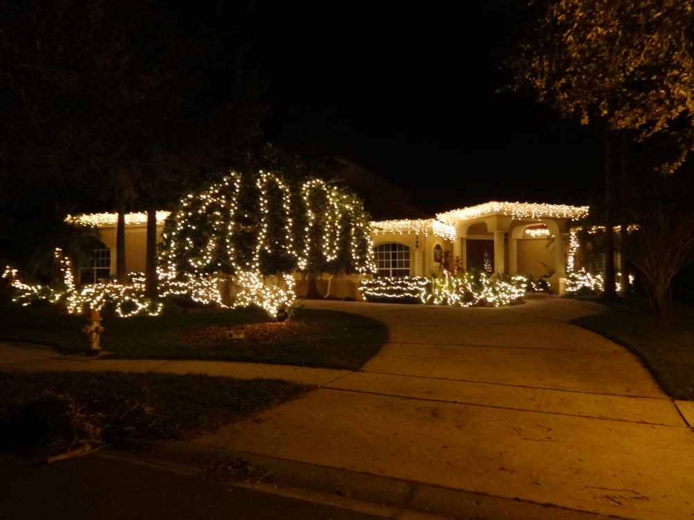 Our home lit up at Christmas.