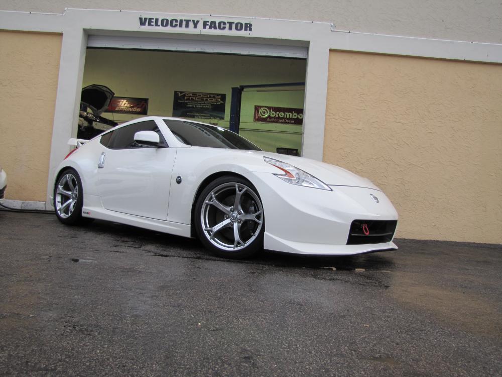 Z Lowered on H&R Sports Springs at Velocity Factor 
www.velocityfactor.org

I have a Facebook page dedicated to 370Z Nismo owners only. Just another way to say in touch with other 370 Nismo owners! If you are interested stop by and check it out!! 

http://www.facebook.com/groups/2321947