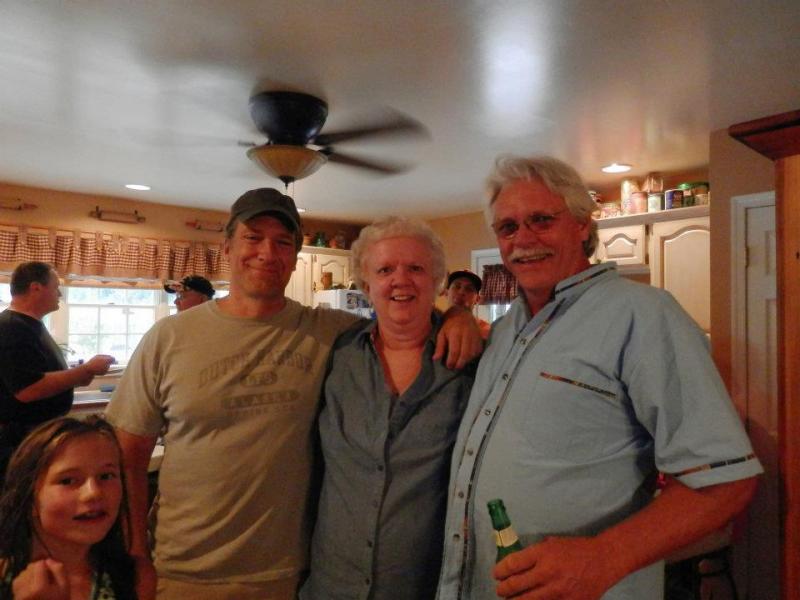 Cousin Mike with my other Cousin (middle) and my Uncle Bill (far right) and the little girl is my little cousin Grace.
