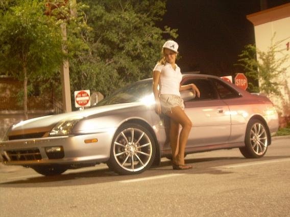 The Wife in front of my 5th gen prelude!