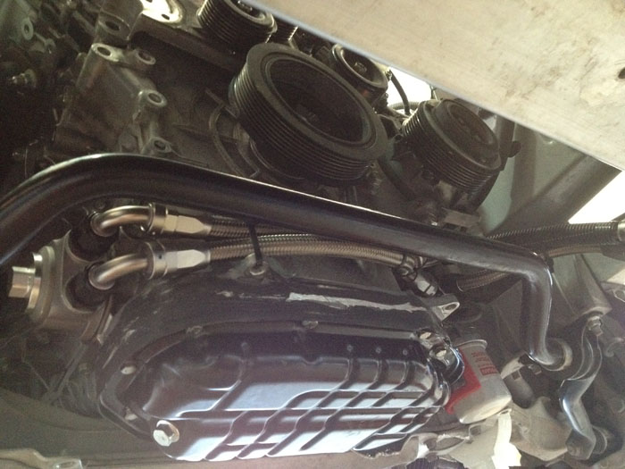 jwt oil pan spacer installed along w/oil filter relocation...this setup took almost 10 qts to fill the entire system.