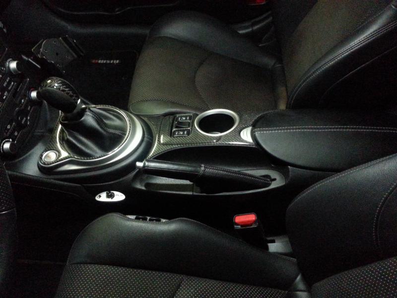 Carbon Fiber & Alcantara Shift Knob
(Tony @ Carbon Fiber Element)

Nissan OEM Manual Shift Boot
TOP GAITERS E-Brake Cover
Custom Console Lid Cover