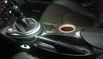 Carbon Fiber & Alcantara Shift Knob 
(Tony @ Carbon Fiber Element) 
 
Nissan OEM Manual Shift Boot 
TOP GAITERS E-Brake Cover 
Custom Console Lid...