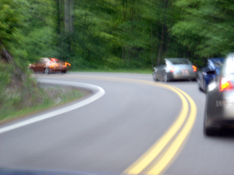 Z Dayz Midwest Caravan 2005 - Enter the Dragon! 

The old guy in the Sunset Lemans was holding us up. The guy rushed ahead of everybody just as we we went from four lanes to two. That's my right behind him.