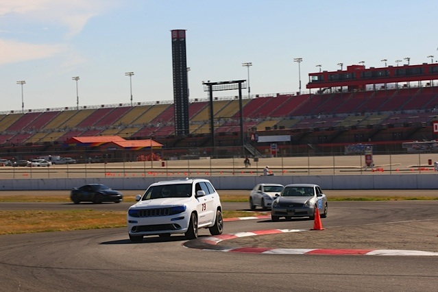 Turn 13 ACS roval. Leading a group of cars.