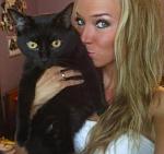 my magnetic black cat with persimmon eyes:) lol