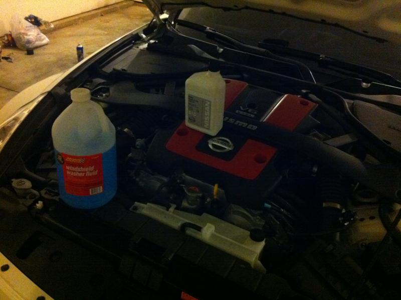 A little short on oil so I added some windshield washer fluid and Nissan Ester oil that I bought from dealership lol. I keep checking for engine oil level since this engine burns a lot oil