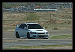 EVO IX with passengers at Pueblo Motorsports Park