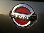 Red backing with Nissan logo