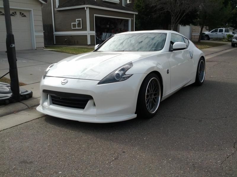 Lowered on Swift springs
Stillen front lip
Blackhoused headlights
Forged Specialties Rims
