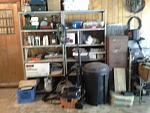 Garage02. Coleman gear and misc. Filing cabinet has two drawerfuls of lamps - from 3W Christmas tree size up 500W halogen. For interior lighting,...