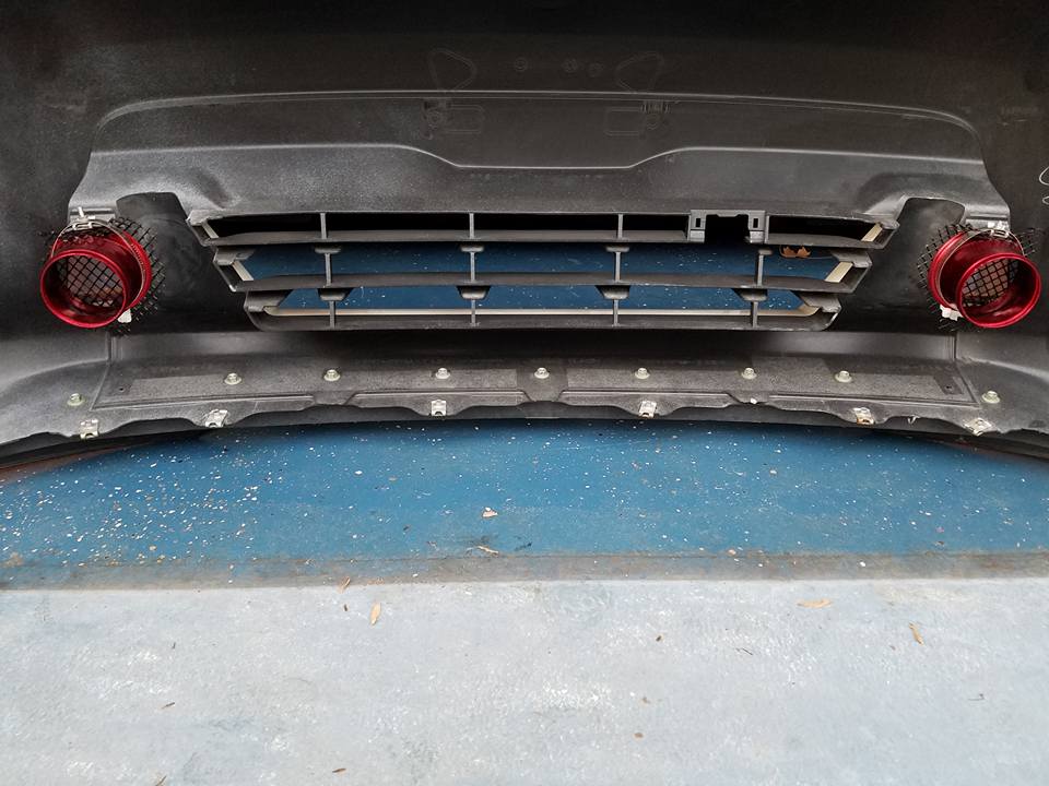 Duct fittings and grills installed on the front end.